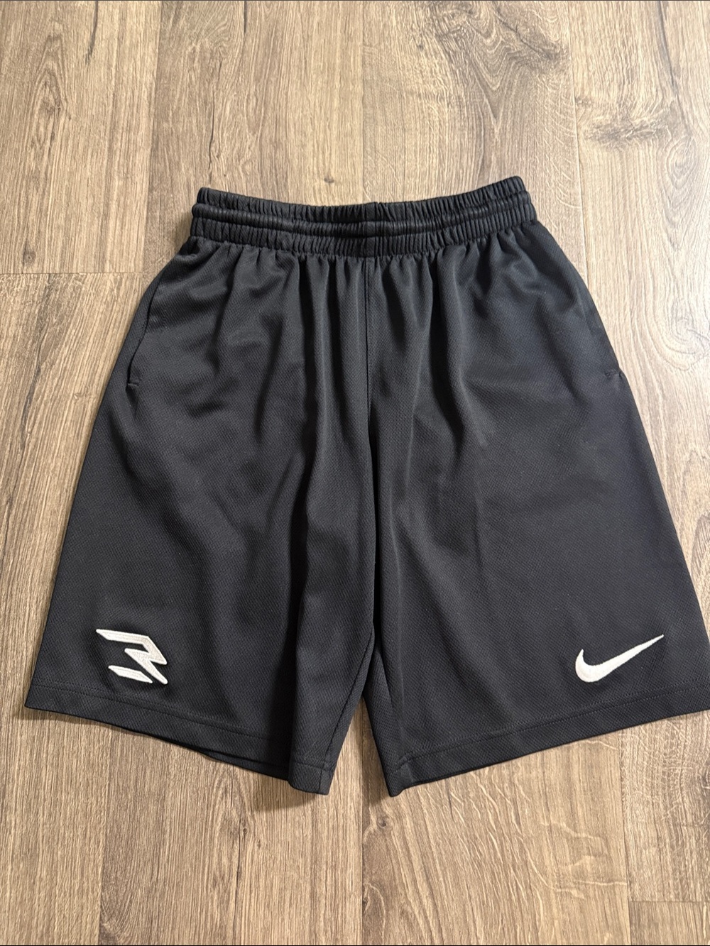Nike boys youth Black Athletic Shorts with White Logos